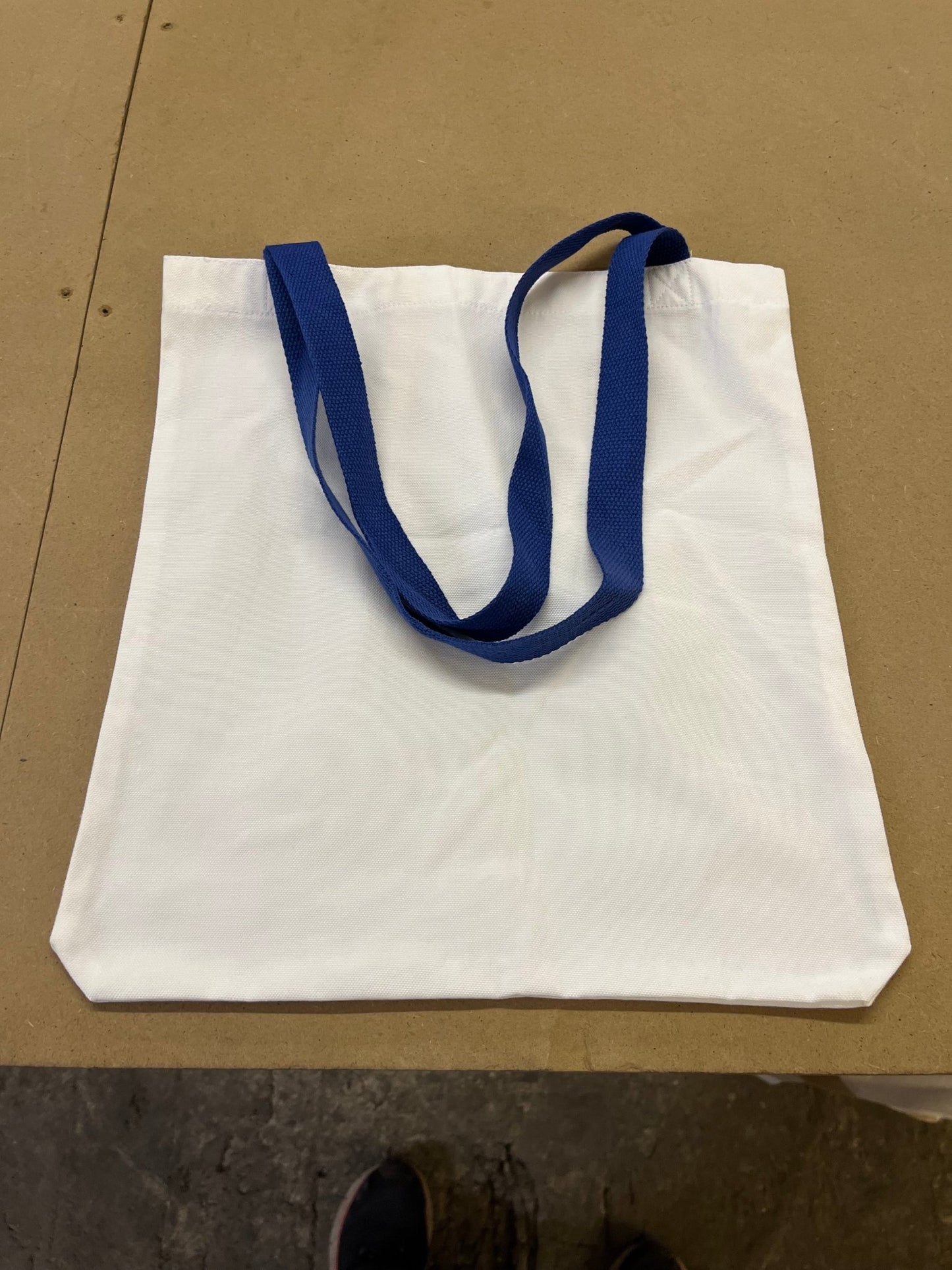 white canvas style tote bag with Blue Handles - artcoasterprinting